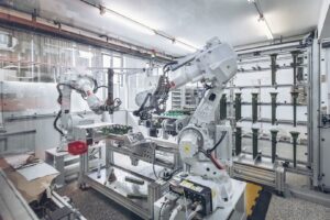 Robotic shell building system for investment casting